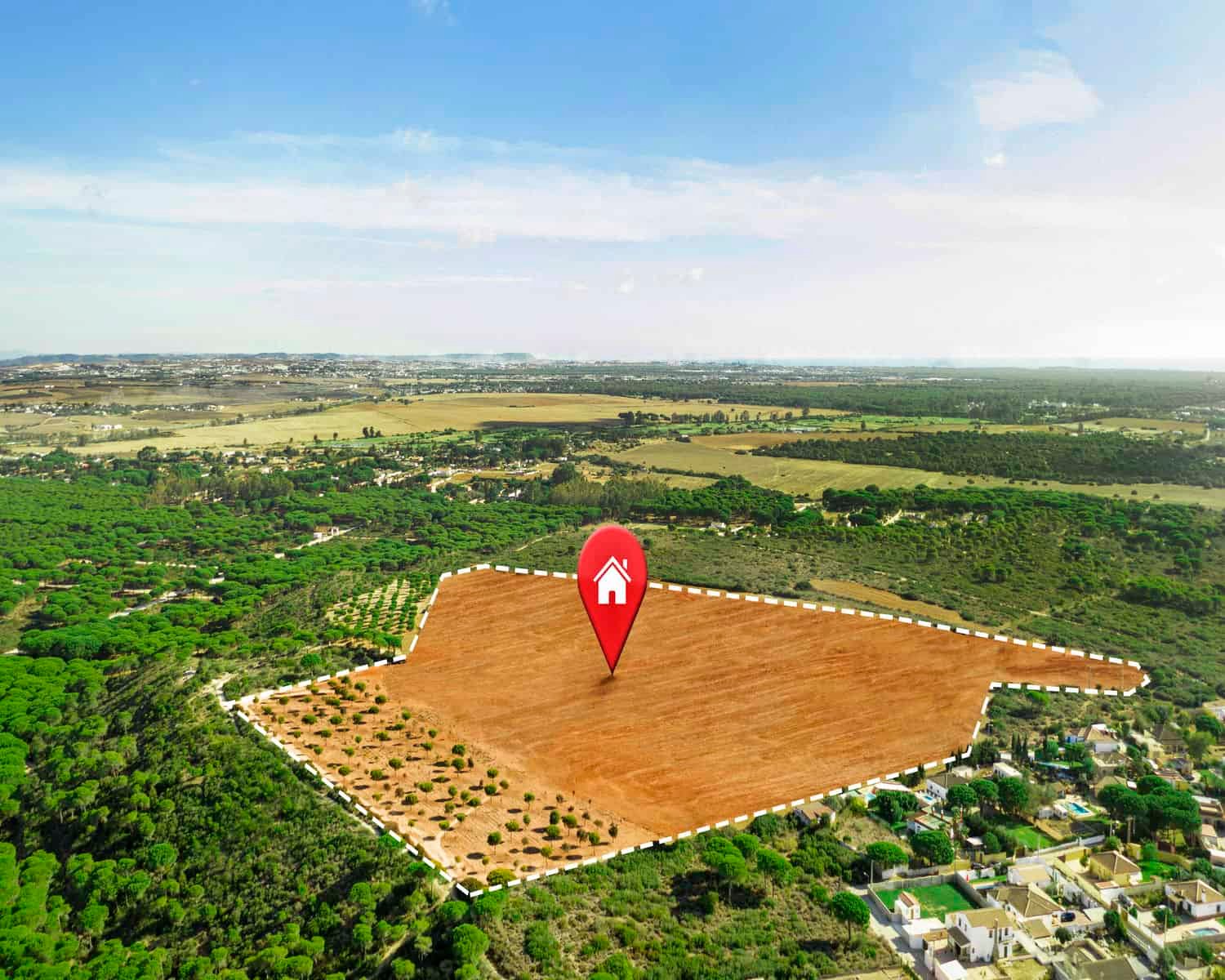 Navigating Property Ownership: Essential Documents Guide 1 Aerial view of a residential land plot marked with an ownership pin