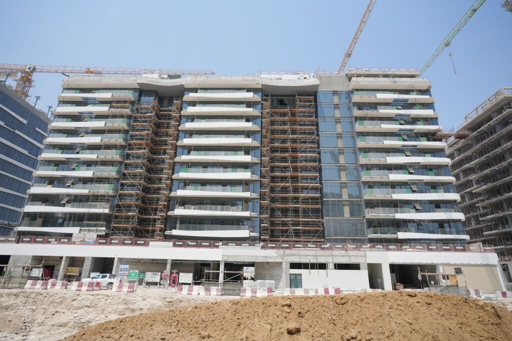 Azizi Venice lagoon-front buildings with facades fitted, September 2026