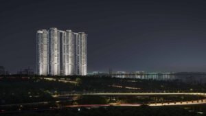 ONE by MSN towers at night