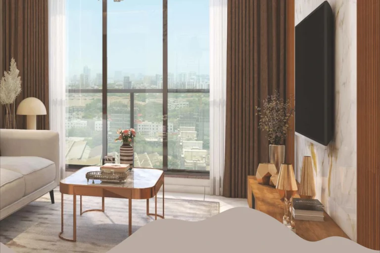 Living room with city view windows at Stellar Crest Santacruz West high rise flats