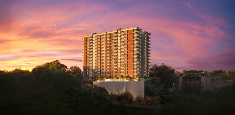 SOBHA Woods towers at dusk on the hill