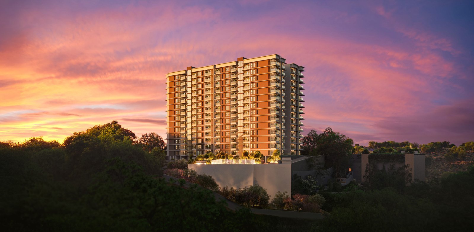 SOBHA Woods towers at dusk on the hill