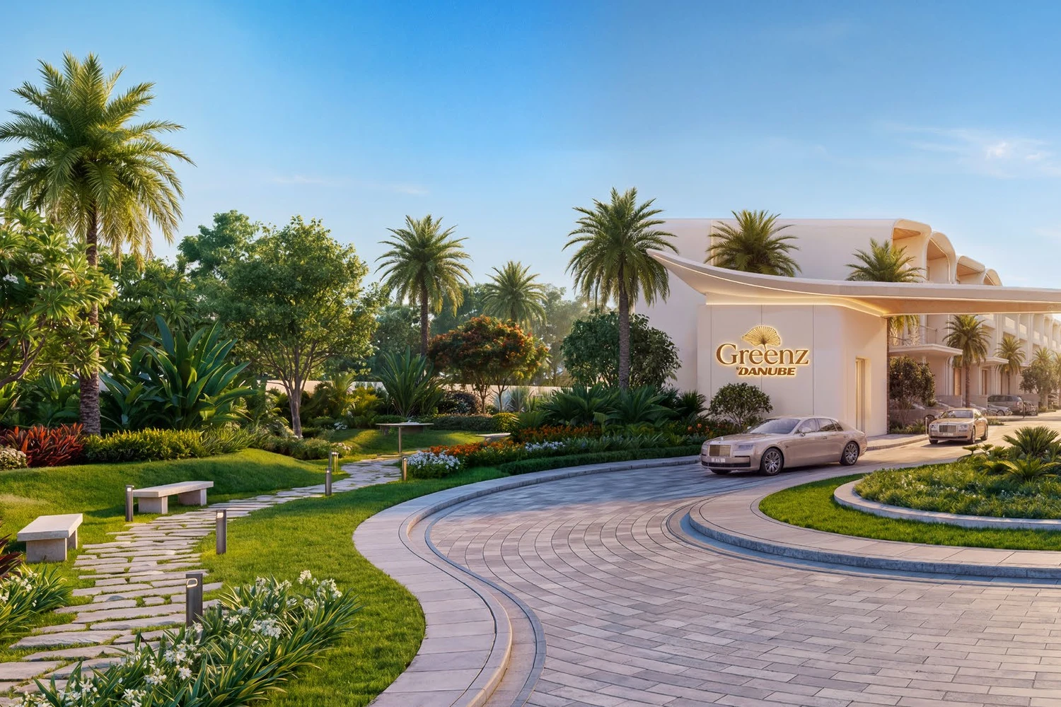 Greenz by Danube clubhouse entrance with signage and landscaped driveway