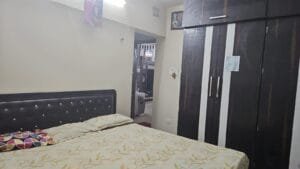 Master bedroom with wardrobe, Sai Mannat Kharghar 3 BHK