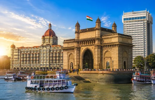 Gateway of India monument in Mumbai with clear blue sky